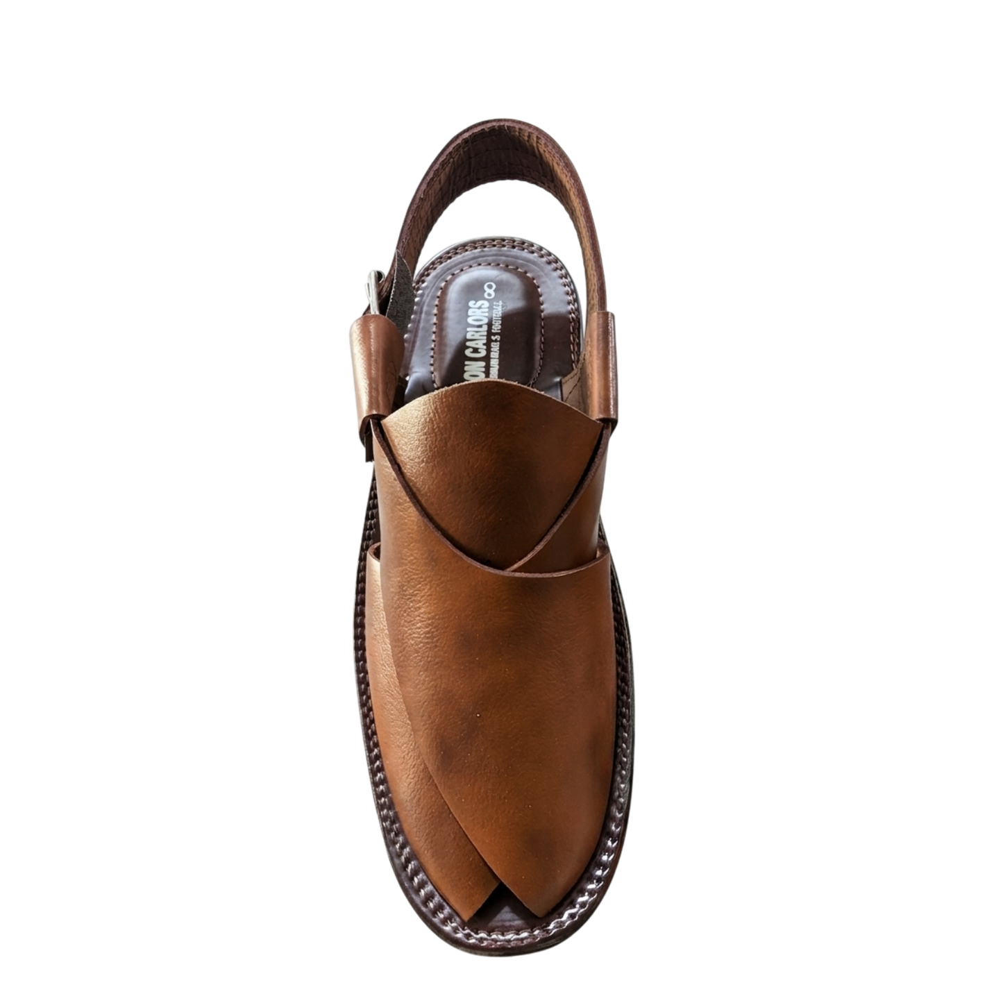 Brown sandal with open design on a white background