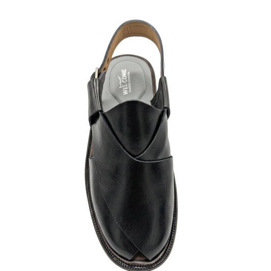 Black sandal with a white sole on a white background