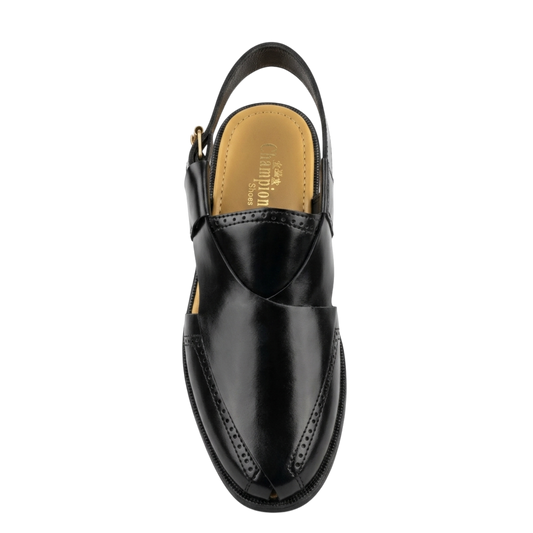 Black leather sandal with a strap on a white background