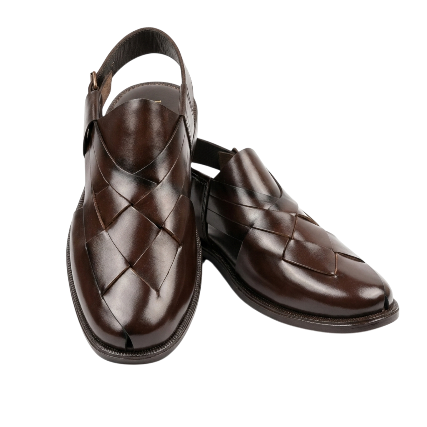 Pair of brown leather shoes with woven design on a white background