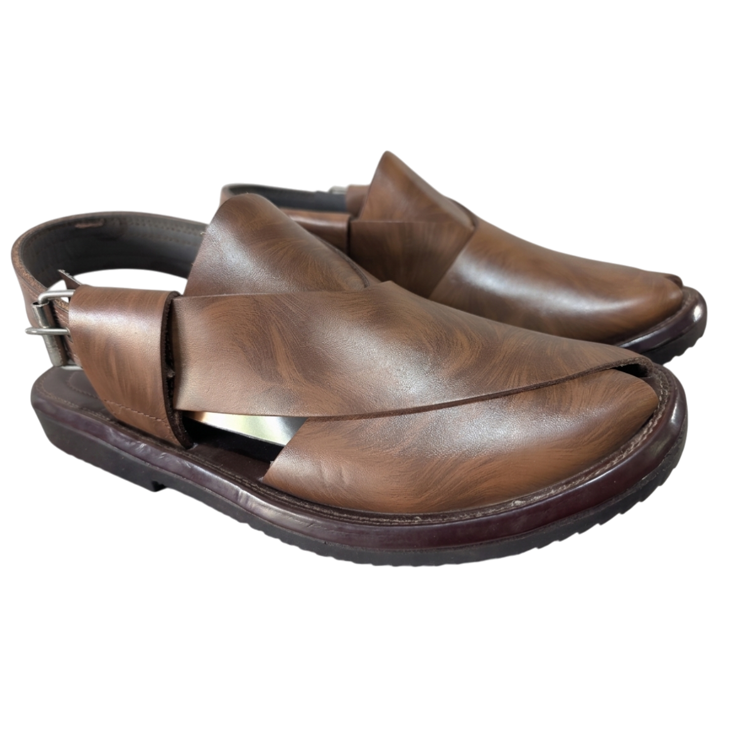 Pair of brown leather shoes on a white background