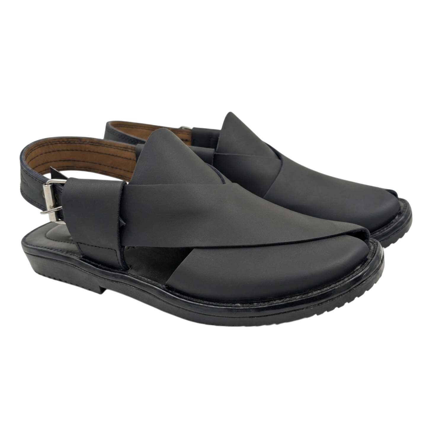 Black sandal with criss-cross straps on a white background
