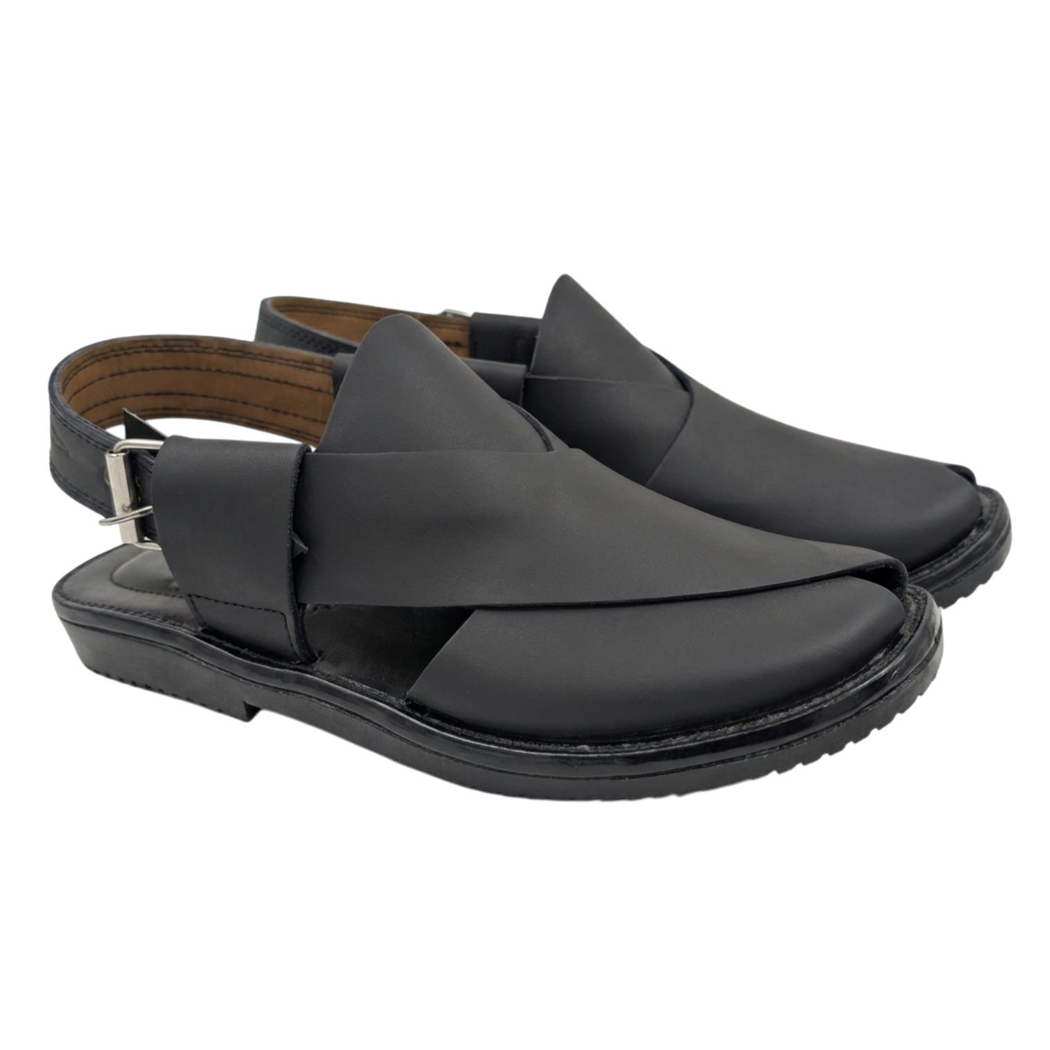 Black sandal with criss-cross straps on a white background